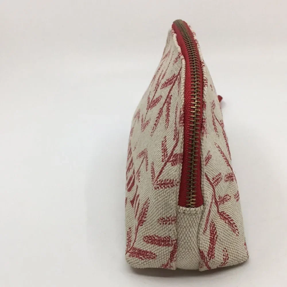 FEED 10 Clarins makeup cosmetics light tan and red carry-all pouch